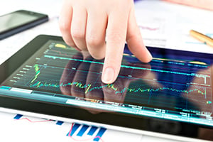 stock market ticker on a tablet